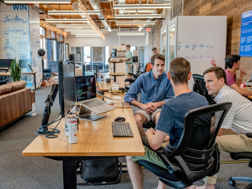 Director and vice president in conversation at the office