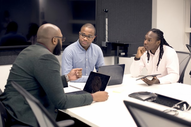 Men in a meeting at an executive level job 