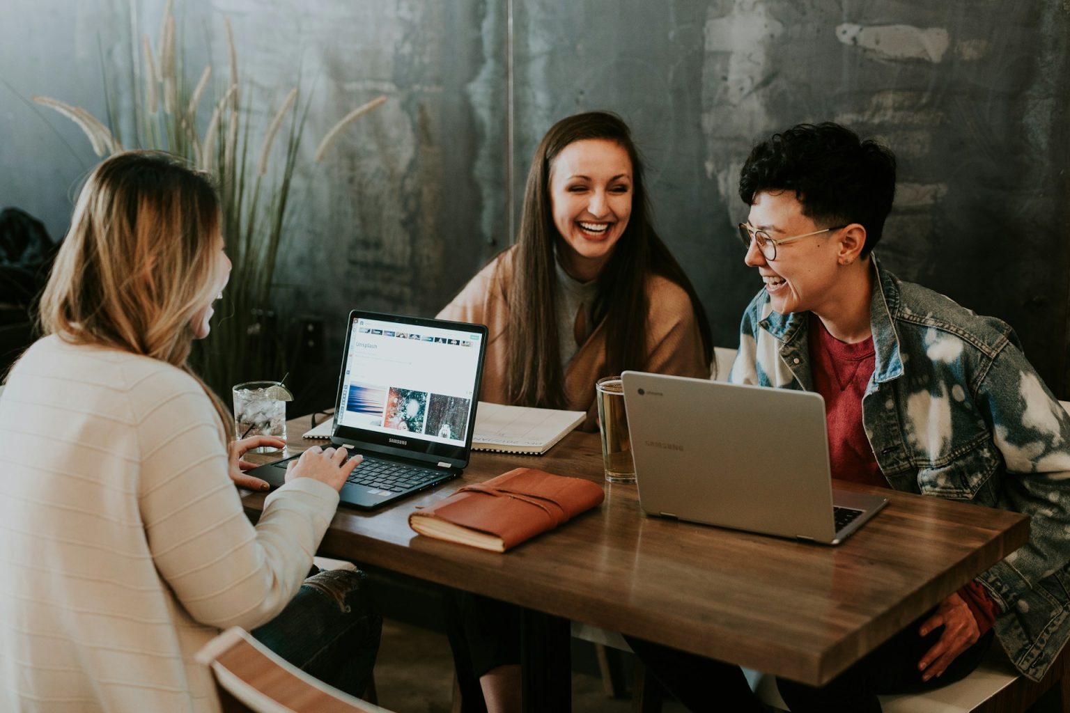 Graduate business student working with data-informed coursework in a classroom setting.