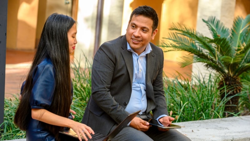 MBA Students Meeting Outside on Campus