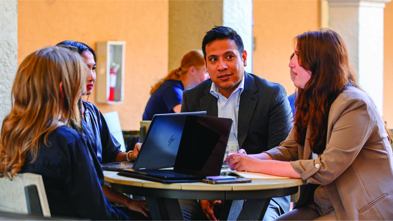 PMBA cohort members in discussion at Crummer.