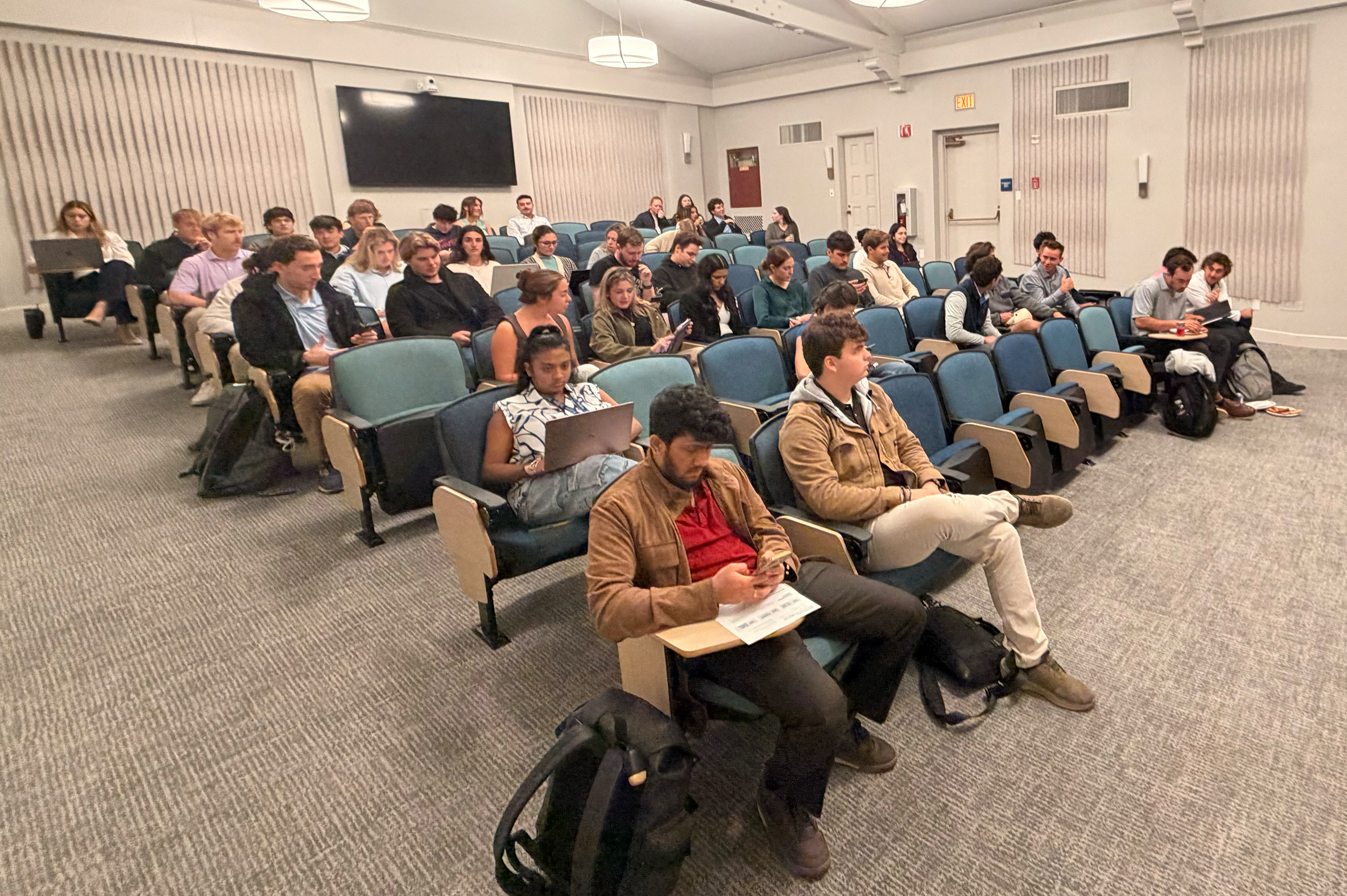 Crummer students participating in an experiential graduate business learning activity.