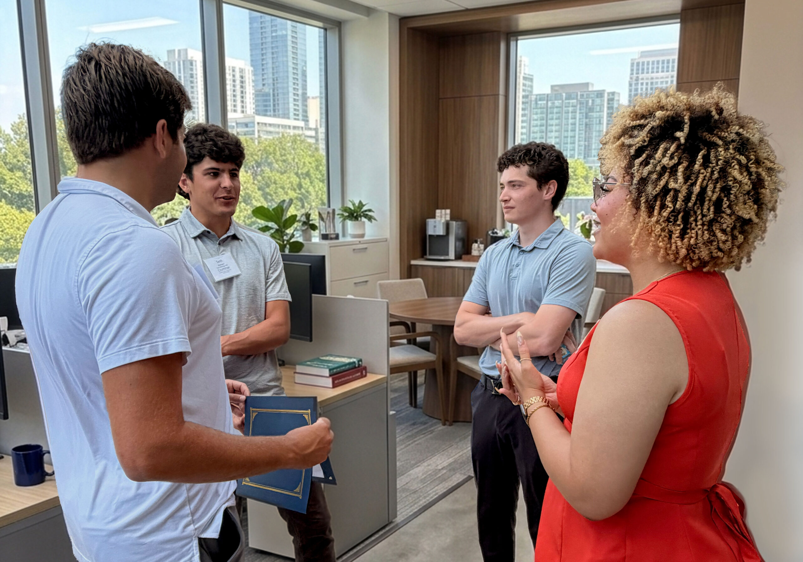 Crummer Accelerated MBA students in conversation during a graduate business class.